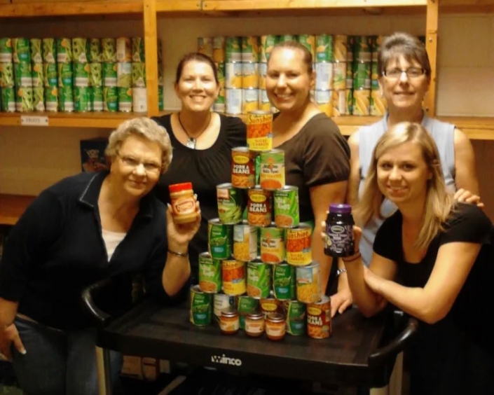 BSS CPA team loading a pantry for a food bank.